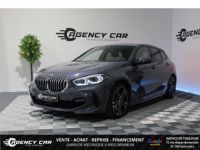 BMW Série 1 SERIE (488E / Mois) 118i  BERLINE F40 M Sport - Toit ouvrant - Caméra - <small></small> 26.990 € <small>TTC</small> - #1