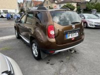 Dacia Duster 1.5 dCi FAP - 110 4x4 Prestige clim + attelage - <small></small> 12.990 € <small>TTC</small> - #3