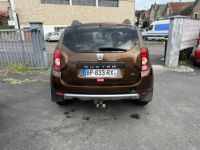 Dacia Duster 1.5 dCi FAP - 110 4x4 Prestige clim + attelage - <small></small> 12.990 € <small>TTC</small> - #4