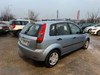 Ford Fiesta 1.4 16v 80ch ghia 5p - <small></small> 3.990 € <small>TTC</small> - #2