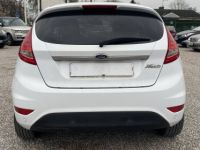 Ford Fiesta IV 1.4 TDCi 70ch FAP Titanium 5p - <small></small> 7.500 € <small>TTC</small> - #4