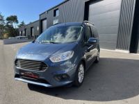 Ford Tourneo Courier  1.5 TDCI 100ch Titanium - <small></small> 14.990 € <small>TTC</small> - #1