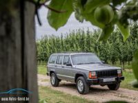 Jeep Cherokee XJ 4.0i Automaat 4X4 - OLDTIMER - SERVO - AIRCO - ELEKTR. RAMEN - <small></small> 19.999 € <small>TTC</small> - #1