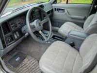 Jeep Cherokee XJ 4.0i Automaat 4X4 - OLDTIMER - SERVO - AIRCO - ELEKTR. RAMEN - <small></small> 19.999 € <small>TTC</small> - #14