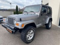 Jeep Wrangler 2.5 120CH ANNIVERSAIRE AWD PNEU MUD+ REHAUSSE 5CM - <small></small> 17.990 € <small>TTC</small> - #4