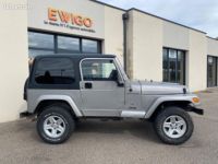 Jeep Wrangler 2.5 120CH ANNIVERSAIRE AWD PNEU MUD+ REHAUSSE 5CM - <small></small> 17.990 € <small>TTC</small> - #9