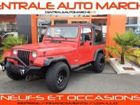 Jeep Wrangler 4.0L 6 CYLINDRES rouge - <small></small> 21.990 € <small>TTC</small> - #1