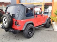 Jeep Wrangler 4.0L 6 CYLINDRES rouge - <small></small> 21.990 € <small>TTC</small> - #3