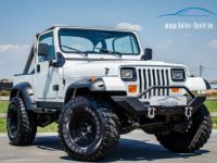 Jeep Wrangler YJ 4.2 4X4 Automaat SOFT TOP - OLDTIMER - LED KOPLAMPEN - BLAUPUNKT - ACHTERBANK - <small></small> 21.500 € <small>TTC</small> - #1