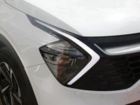 Kia Sportage 1.6 T-GDI 230 Hybrid Active BVA (1ère main, CarPlay, Attelage, Aide à la conduite) - <small></small> 31.990 € <small>TTC</small> - #35