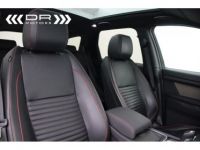Land Rover Discovery Sport 2.0D AWD SE DYNAMIC aut. 150PK - LEDER NAVI DAB MIRROR LINK - <small></small> 32.995 € <small>TTC</small> - #13