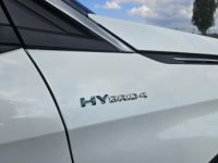 Peugeot 3008 Hybrid4 - 300 - e-EAT8  I GT Blanc nacré - <small></small> 26.890 € <small>TTC</small> - #21