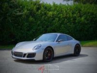 Porsche 911 991.2 Carrera 4 GTS - PORSCHE APPROVED - 3.0L - 450ch - PDK - Gris Argent GT Métal. - Faible Kilométrage - Traitement Céramique - PSE - Toit Ouvrant P - <small></small> 134.991 € <small>TTC</small> - #1