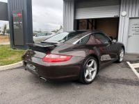 Porsche 911 Carrera (997) Targa 4 3.6i 325ch BVM6 Française Entretien 100% JA 19 Classic BOSE PCM Sièges Cocoa électriques chauffants à mémoire Régulateur Xénon R - <small></small> 62.990 € <small>TTC</small> - #3