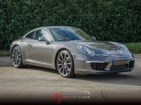 Porsche 911 (ph. 1) Carrera S 400 Ch PDK - Etat NEUF - Echapp. Sport, Toit Ouvrant, Cuir étendu, Volant SportDesign - 4 Pneus Récents - Carnet PORSCHE - Garantie - <small></small> 102.991 € <small>TTC</small> - #1