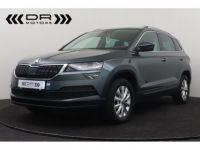 Skoda Karoq 1.6CRTDI AMBITION - LEDER NAVI DAB MIRROR LINK - <small></small> 18.495 € <small>TTC</small> - #1