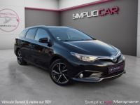 Toyota Auris Touring Sports Hybride 136h Executive / SIEGES CHAUFFANTS / CAMERA RECUL / ATTELAGE AMOVIBLE / GARANTIE 12 MOIS - <small></small> 14.980 € <small>TTC</small> - #1