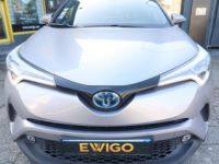 Toyota C-HR 1.8 122H 100 HYBRID FULL-HYBRID DISTINCTIVE 4X2 BVA + SIEGES AV CHAUFFANTS - <small></small> 14.989 € <small>TTC</small> - #9