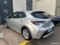 Toyota Corolla 122h Dynamic Business MY20 + lombaire Historique d'entretien Garantie 12 mois 1ère main Caméra de recul Sièges chauffants - <small></small> 15.990 € <small>TTC</small> - #4