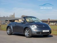 Volkswagen Beetle New Cabrio 2.0i Tiptronic - 1STE EIGENAAR - LEDER - AIRCO - PARKEERSENSOREN - <small></small> 4.999 € <small>TTC</small> - #1