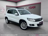 Volkswagen Tiguan 1.4 TSI 160 BlueMotion Technology Carat DSG6 SUIVI COMPLET VW* TOIT PANO OUVRANT* XENONS* SIÈGES ÉLECS CHAUF* GARANTIE - <small></small> 15.900 € <small>TTC</small> - #1