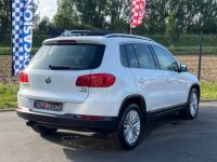 Volkswagen Tiguan 2.0 TDI 110CH BLUEMOTION CUP TOIT OUVRANT/ GPS/ 04/2014 - <small></small> 11.990 € <small>TTC</small> - #3