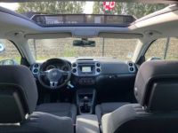 Volkswagen Tiguan 2.0 TDI 110CH BLUEMOTION CUP TOIT OUVRANT/ GPS/ 04/2014 - <small></small> 11.990 € <small>TTC</small> - #9