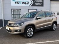 Volkswagen Tiguan 2.0 TSI 210 CV SPORTLINE 4MOTION BVM6 / 1E MAIN / 56300KM / ATTELAGE / SUIVI FULL - <small></small> 16.490 € <small>TTC</small> - #1