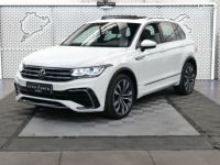 Volkswagen Tiguan NEW eHYBRID 245CH R-LINE EXCLUSIVE DSG 1°MAIN FRANCAIS TVA RECUPERABLE pack ja20 attelage xenon gps virtual cockpit key less go TOIT PANORAMQUE CAMERA - <small></small> 39.950 € <small>TTC</small> - #1