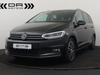 Volkswagen Touran 1.6TDI HIGHLINE DSG - 7 PLAATSEN NAVI LEDER PANODAK - <small></small> 21.995 € <small>TTC</small> - #1