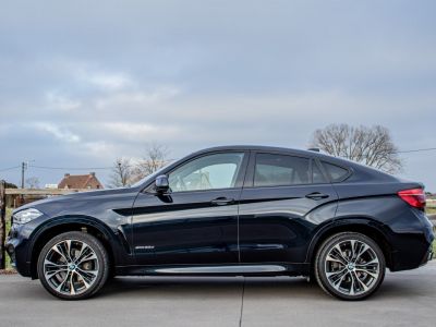 BMW X6 3.0dAS xDrive M-Pack - 1 EIGENAAR - HISTORIEK - CARBON -  ZETELVERWARMING - PANO DAK - PARKEERSENSOREN - KEYLESS START - EURO 6  - 7