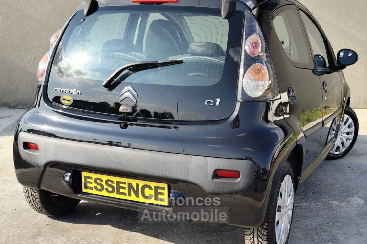 Citroen C1 Phase 3 - 1.0i 12V - 4 cv (68 ch) - 5 portes - Noir - Finition Attraction - 2013 - <small></small> 4.990 € <small>TTC</small> - #2