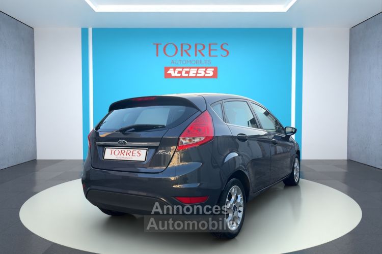 Ford Fiesta 1.4 97ch TITANIUM 5P BVM - <small></small> 7.990 € <small>TTC</small> - #6