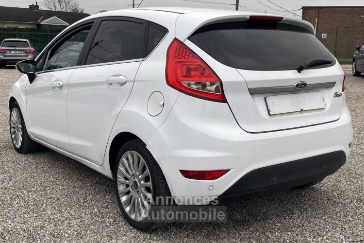 Ford Fiesta IV 1.4 TDCi 70ch FAP Titanium 5p - <small></small> 7.500 € <small>TTC</small> - #5