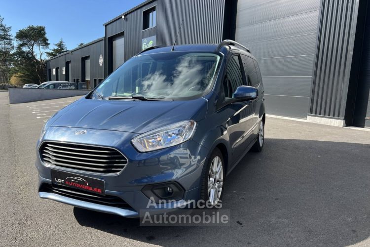 Ford Tourneo Courier  1.5 TDCI 100ch Titanium - <small></small> 14.990 € <small>TTC</small> - #1