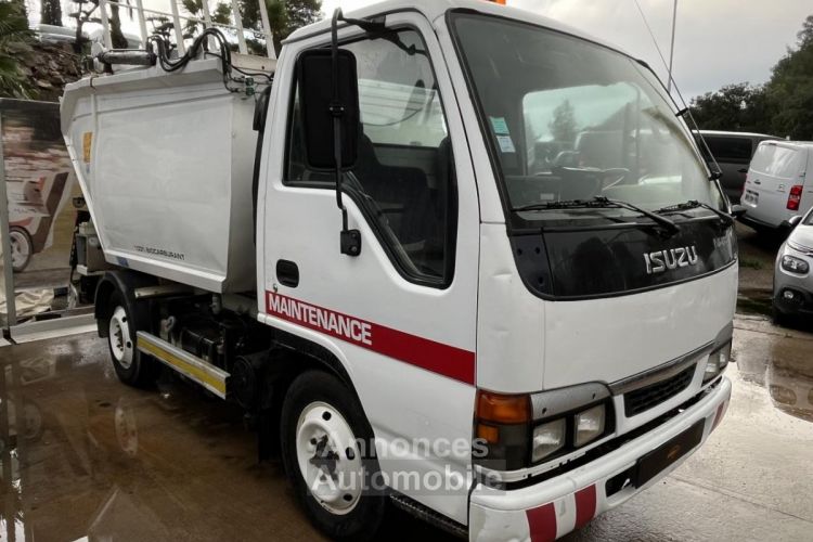 Isuzu N-Series N SERIES N 3.0 D Cabine  3pl BENNE POUBELLE NKR 77 - KS 35 - <small></small> 6.990 € <small></small> - #1