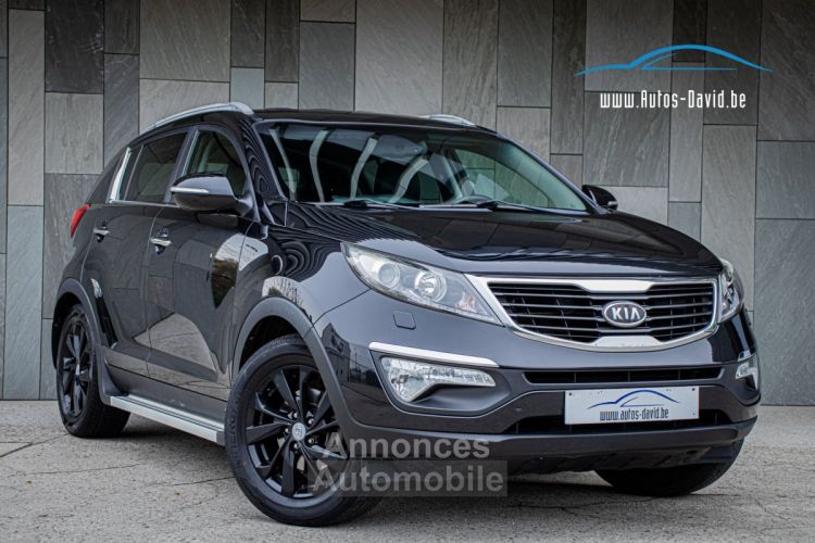 Kia Sportage New 1.6i 2WD - 1STE EIGENAAR - TREKHAAK - CAMERA - KEYLESS GO - ZETELVERWARMING - XENON - <small></small> 7.999 € <small>TTC</small> - #1