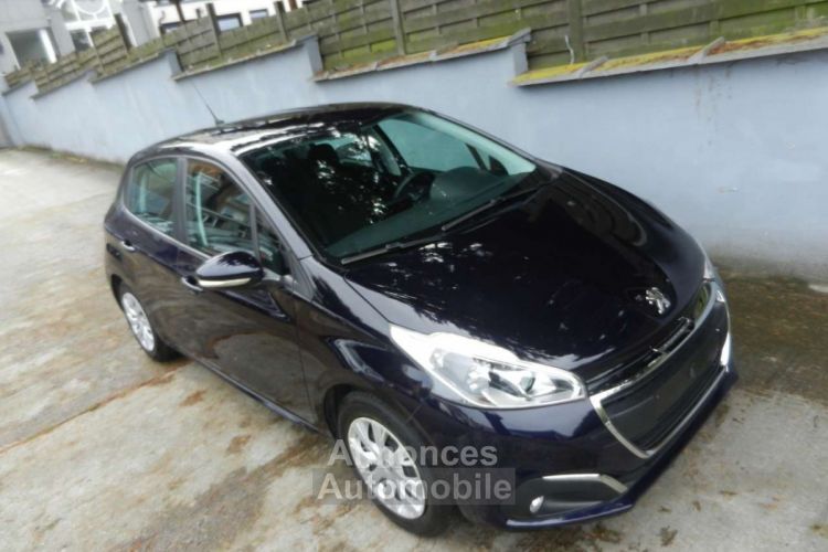 Peugeot 208 1.2i PureTech Style (navigation pdc clim ect) - <small></small> 7.000 € <small>TTC</small> - #9