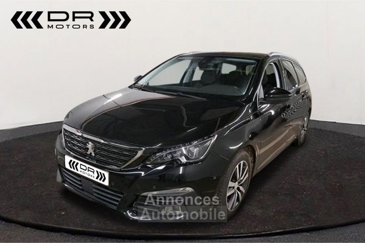 Peugeot 308 SW 1.5 BlueHDI EAT8 ALLURE - NAVIGATIE LEDER APPLE CARPLAY/ANDROID AUTO PANODAK ADAP CRUISE - <small></small> 14.995 € <small>TTC</small> - #1