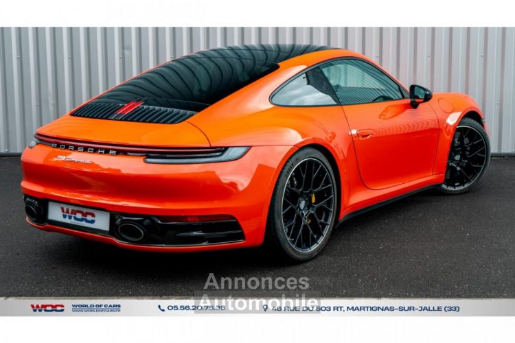 Porsche 911 992 Carrera S 450ch / orange lava - <small></small> 127.992 € <small>TTC</small> - #77