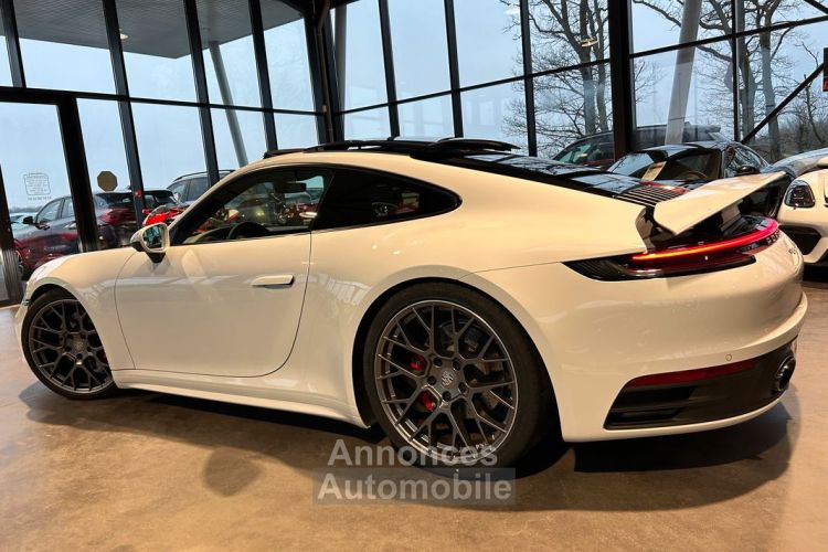 Porsche 911 Type 992 Carrera 4S 450 ch Jupes Sport Design Toit Ouvrant Pack Carbone chrono Echappement PASM Bose 20P Garantie 6 ans 1269-mois - <small></small> 144.992 € <small>TTC</small> - #2