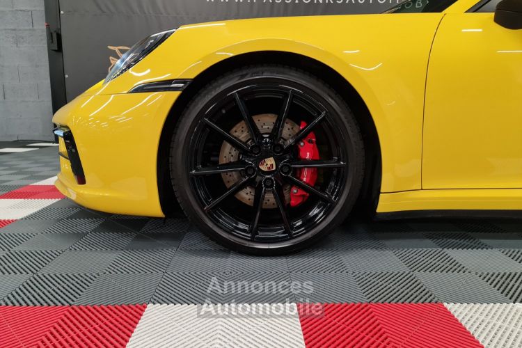 Porsche 992 PORSCHE 992 CARRERA 4S CABRIOLET JAUNE RACING – ÉCHAPPEMENT SPORT / SPORT DESIGN - <small></small> 139.990 € <small></small> - #6