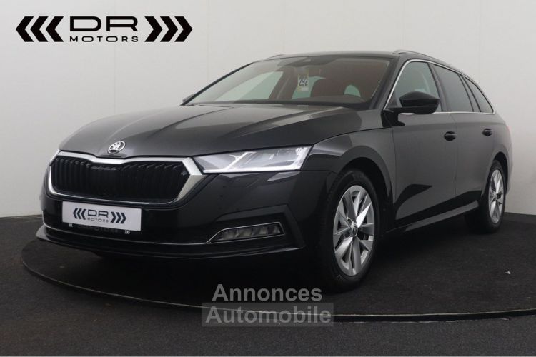 Skoda Octavia Combi 1.0TSI DSG / AUTOMAAT - APPLE CARPLAY ANDROID TREKHAAK TOPSTAAT - <small></small> 19.995 € <small>TTC</small> - #1