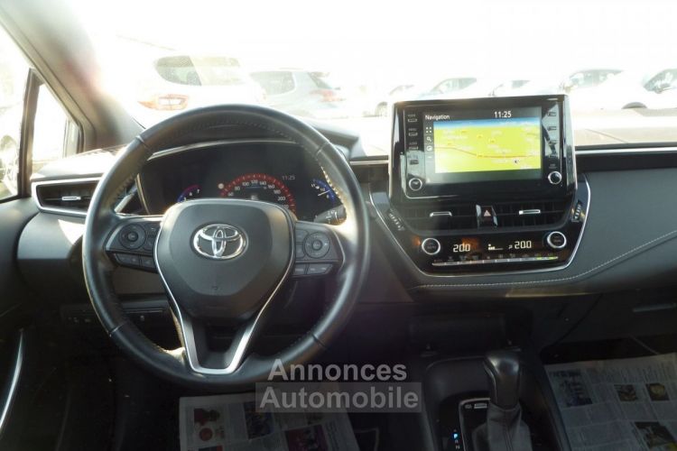 Toyota Corolla 1.8 HYBRID 122H DYNAMIC BUSINESS BOITE AUTO - <small></small> 19.950 € <small>TTC</small> - #8