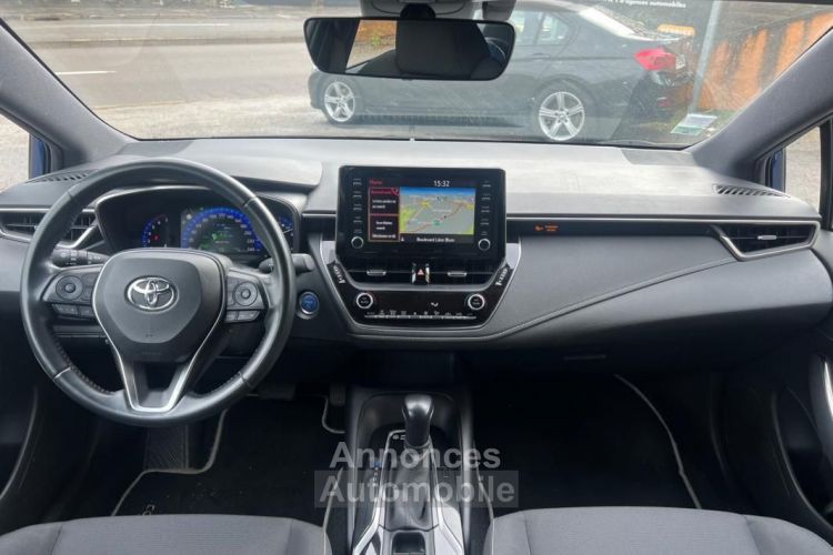 Toyota Corolla TOURING-SPORTS 1.8 122H 100 HYBRID FULL-HYBRID DYNAMIC BUSINESS BVA - <small></small> 19.990 € <small>TTC</small> - #14