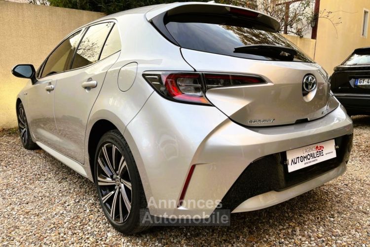 Toyota Corolla XII HYBRIDE 122H 5CV DESIGN *Caméra, CarPlay* - <small></small> 20.490 € <small>TTC</small> - #7