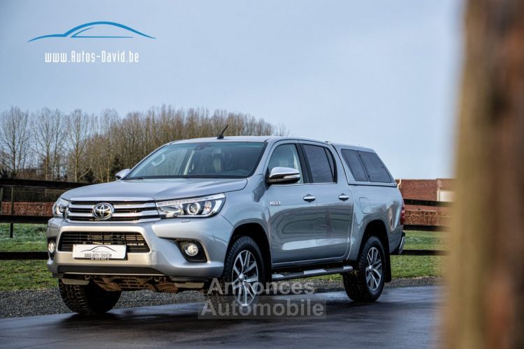 Toyota Hilux 2.4 D-4D 4WD Lounge - LICHTE VRACHT - TREKHAAK - 220V - CAMERA - CRUISECONTROL - KEYLESS GO - EURO 6 - <small></small> 28.999 € <small>TTC</small> - #1