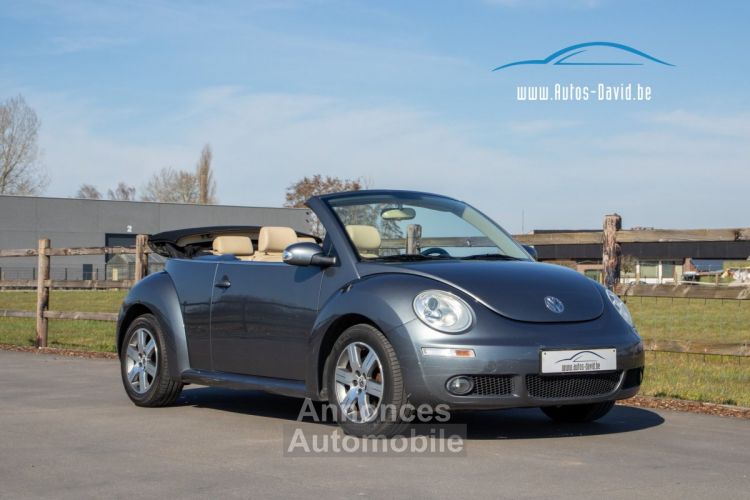 Volkswagen Beetle New Cabrio 2.0i Tiptronic - 1STE EIGENAAR - LEDER - AIRCO - PARKEERSENSOREN - <small></small> 4.999 € <small>TTC</small> - #1