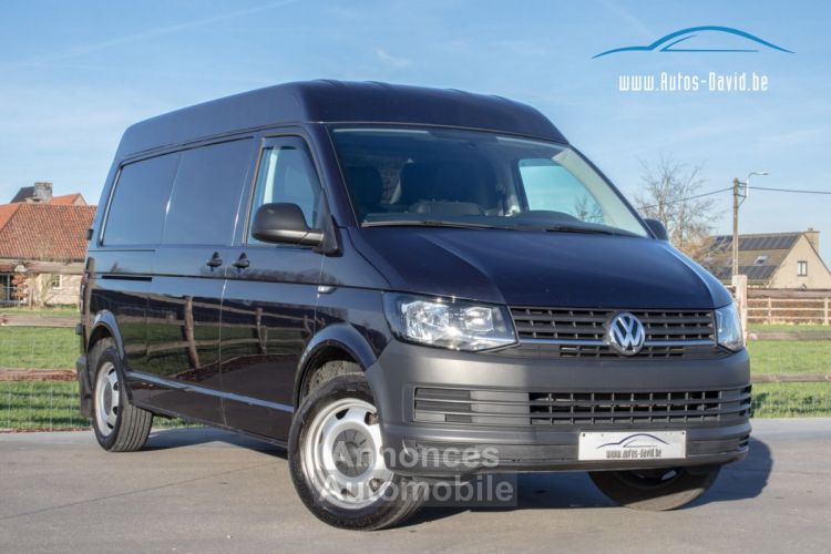 Volkswagen T6 Volkswagen Transporter High Roof 2.0 TDI 204PK - LICHTE VRACHT - 3 PLAATSEN - SENSOREN - AIRCO - TREKHAAK - EURO 6 - <small></small> 22.999 € <small>TTC</small> - #1