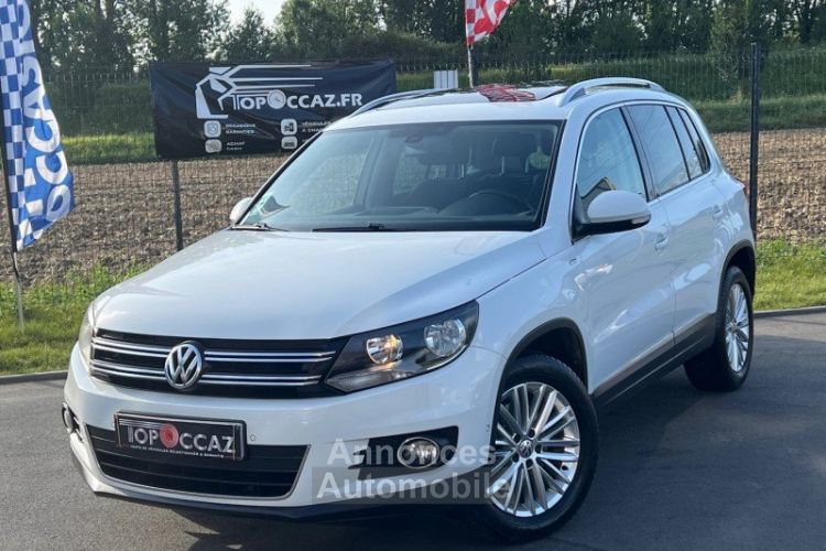 Volkswagen Tiguan 2.0 TDI 110CH BLUEMOTION CUP TOIT OUVRANT/ GPS/ 04/2014 - <small></small> 11.990 € <small>TTC</small> - #1